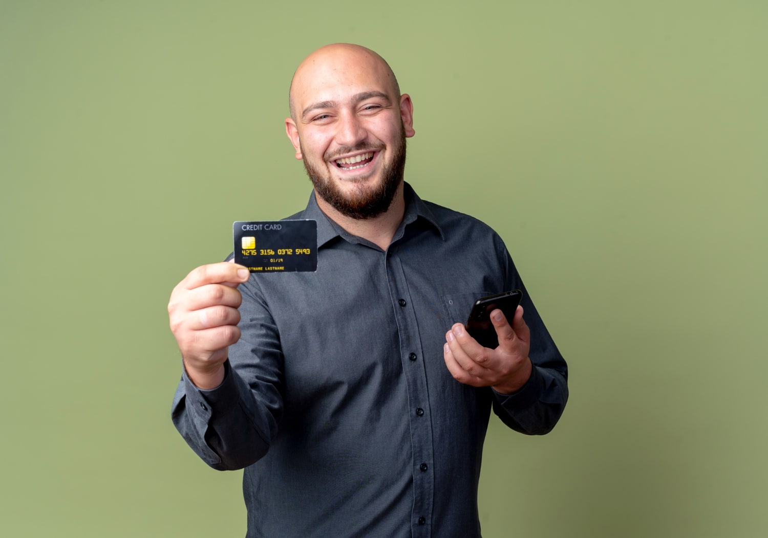 A happy man with his BMO Cashback World Elite Mastercard