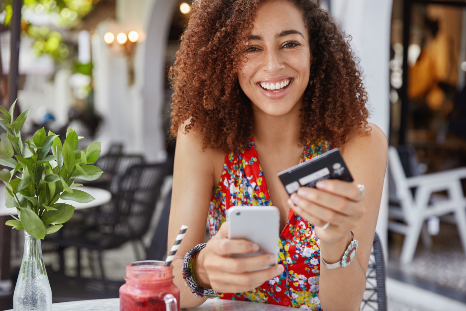 A girl using her BMO World Elite Mastercard at the restaurant.