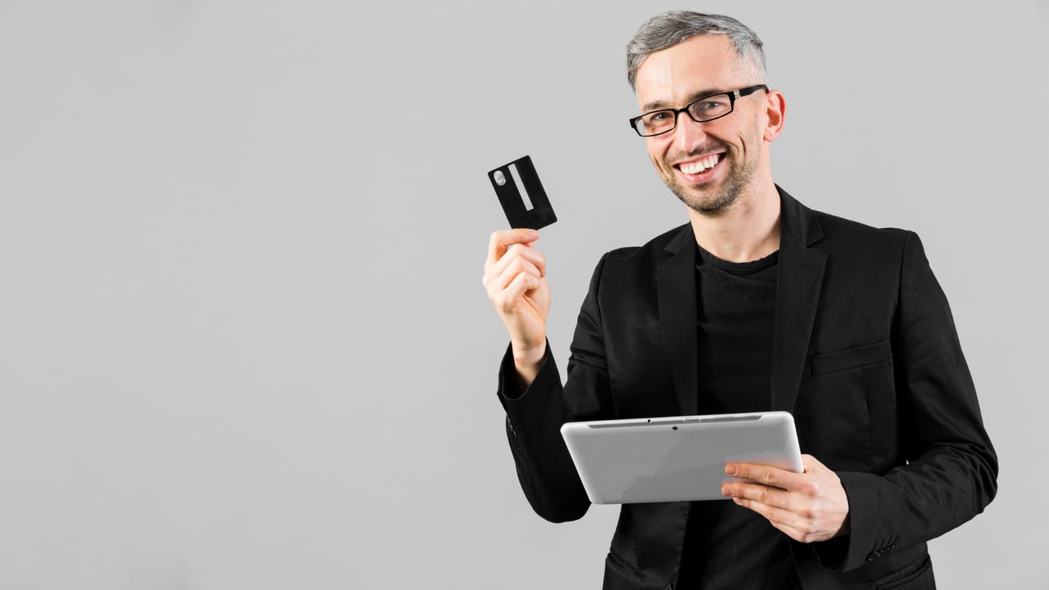 A happy man with his Scotiabank American Express Card.