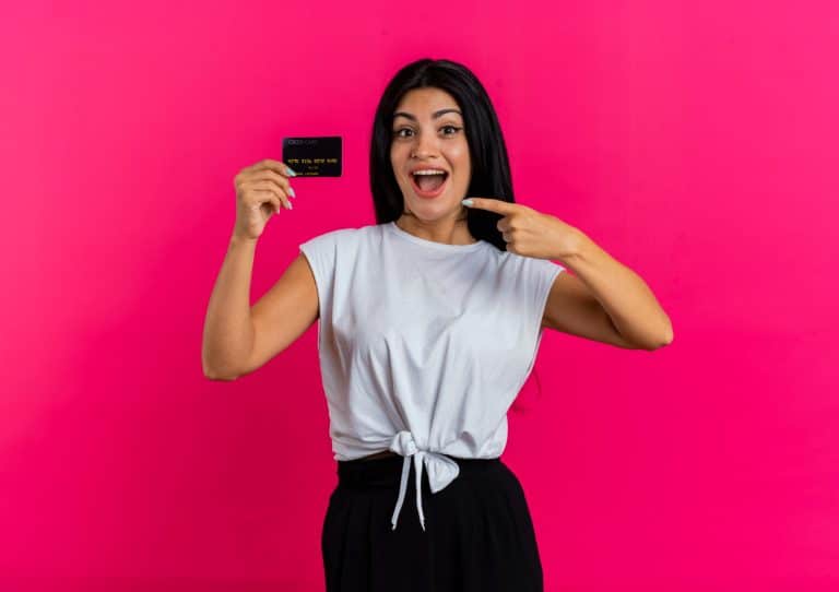 A woman with her Scotiabank Gold American Express.