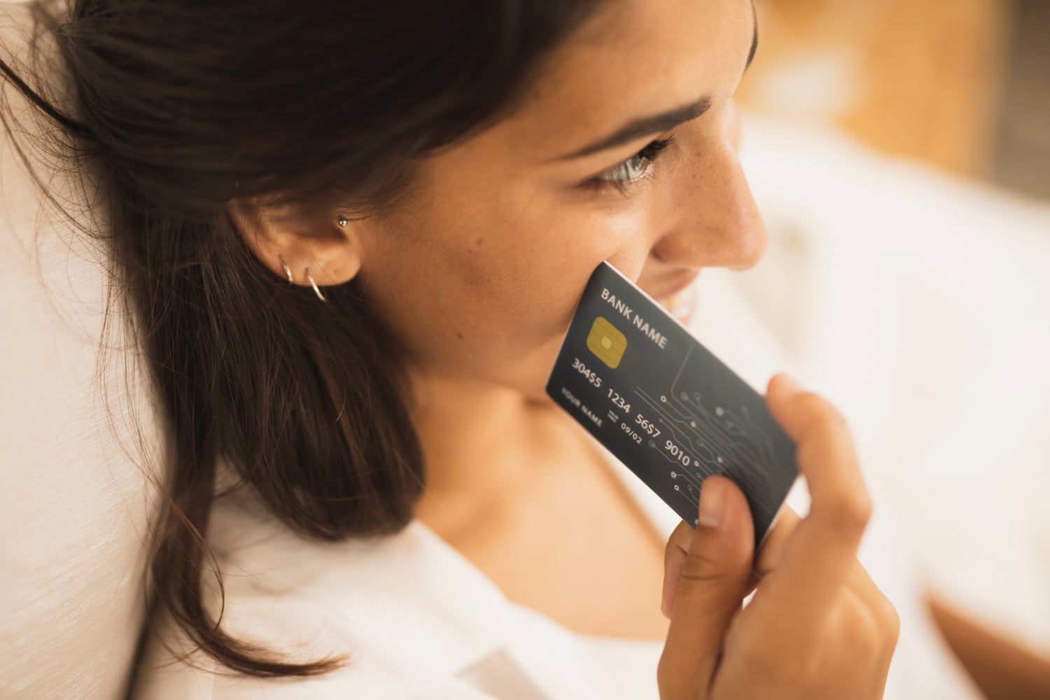 A girl with her Scotiabank Gold American Express