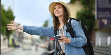 Woman using credit cards for travel during her trip.