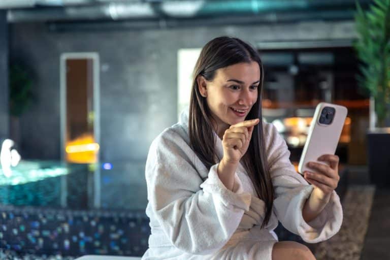 Woman looking for the Best Smartphones in 2024