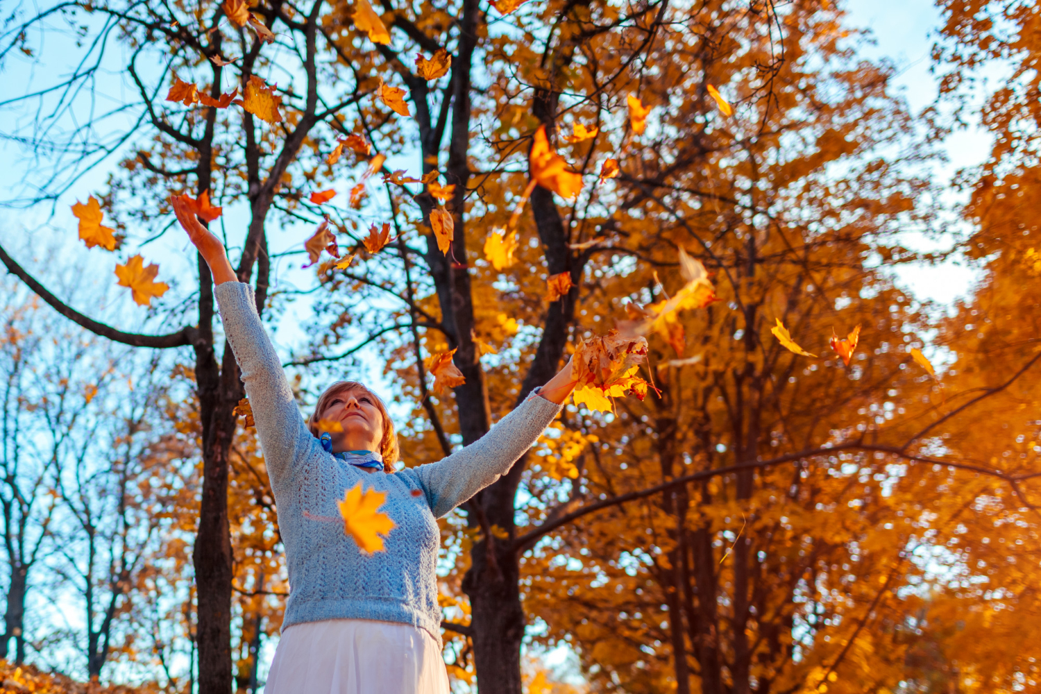 woman enjoys the fall season in Canada