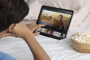 Man choosing the Netflix Canada 2025 releases