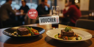 Two gourmet dishes on a table with a 'buy one get one free' dining voucher overlay, symbolizing exclusive savings.